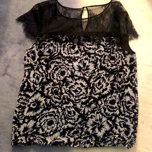 Ann Taylor blouse black and white floral print. See through lace shoulders.